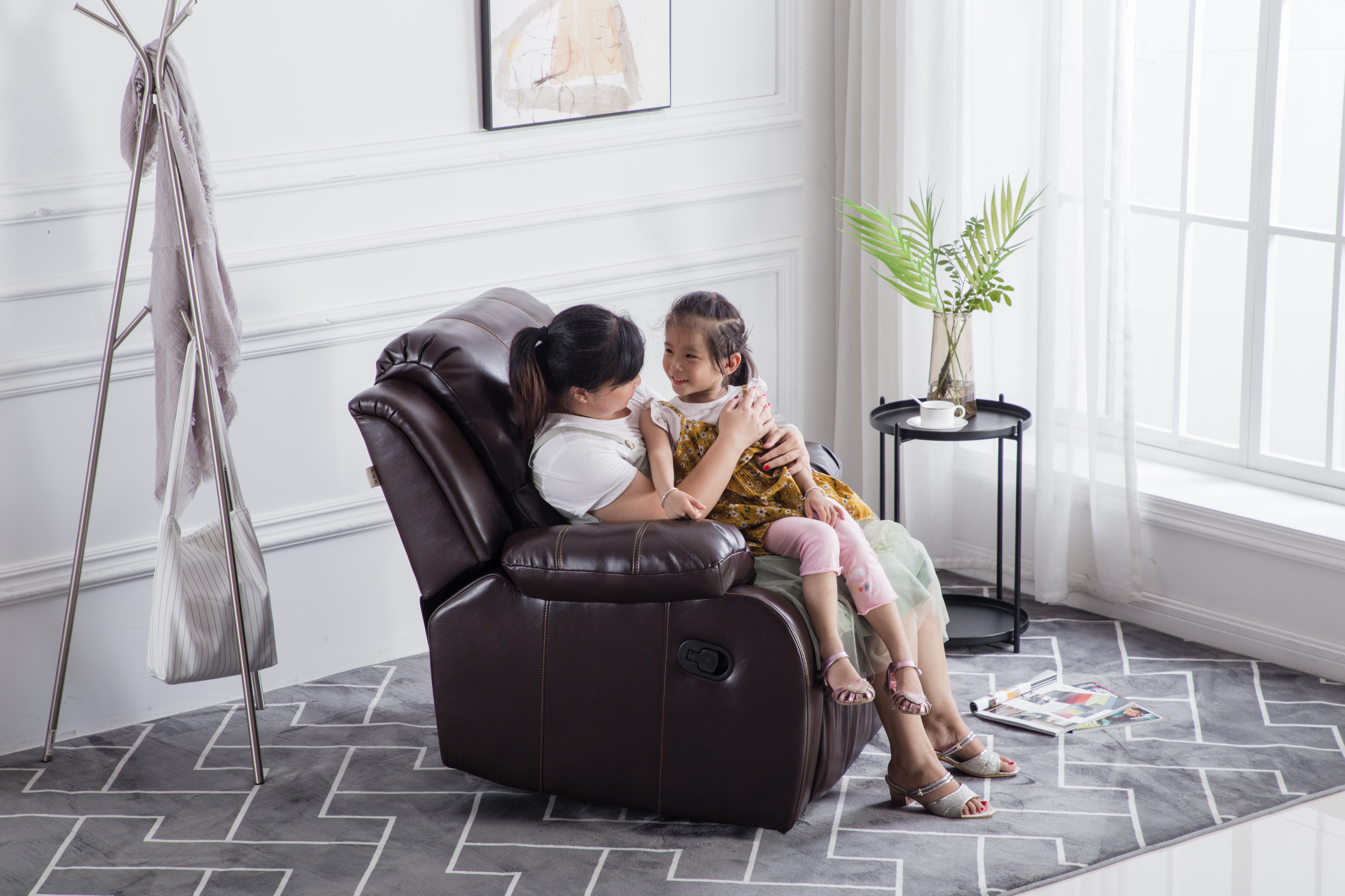 Brown faux leather manual recliner chair with contrast stitching, classic single reclining sofa Brown faux leather manual recliner chair with contrast stitching, classic single reclining sofa