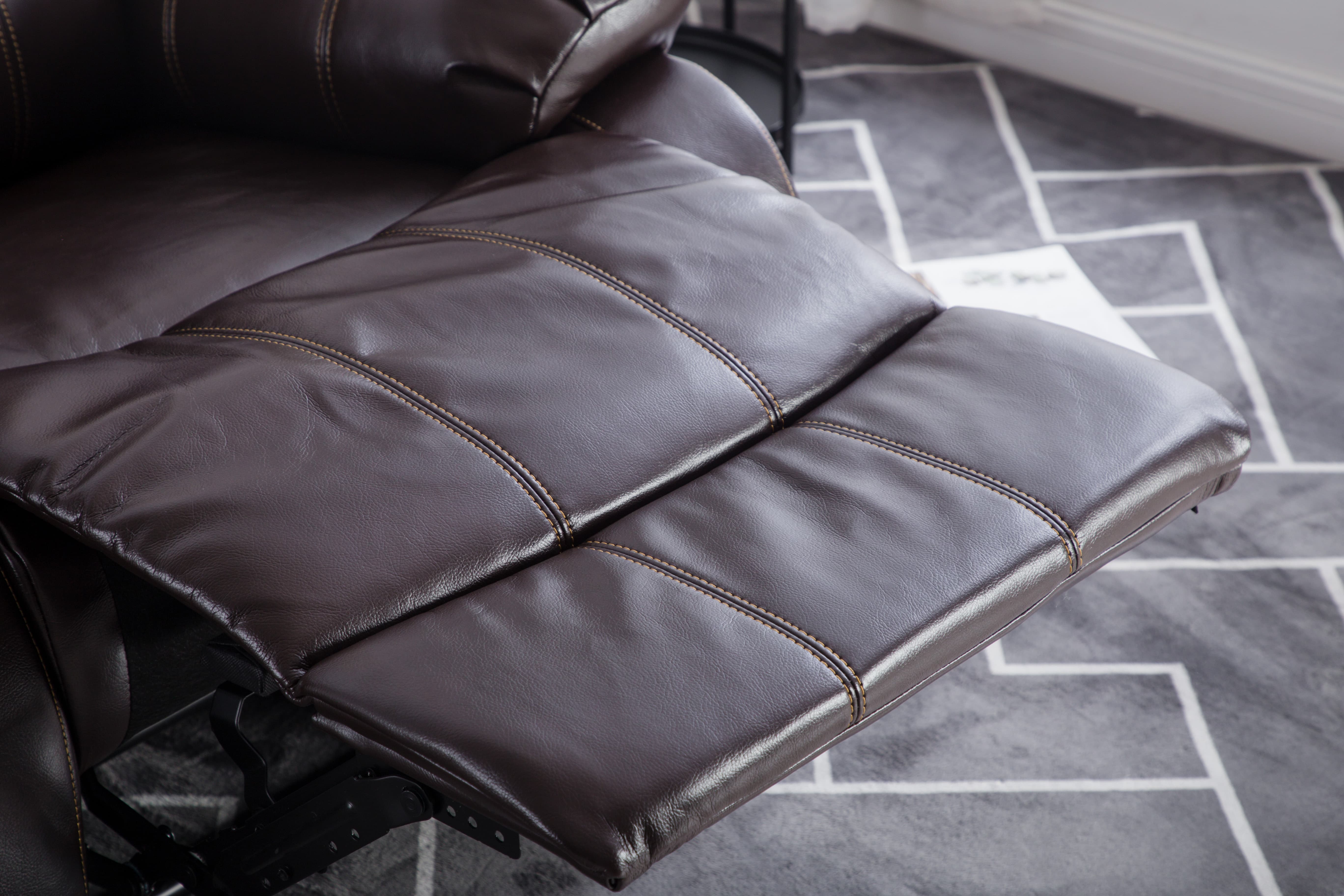 Brown faux leather manual recliner chair with contrast stitching, classic single reclining sofa Brown faux leather manual recliner chair with contrast stitching, classic single reclining sofa
