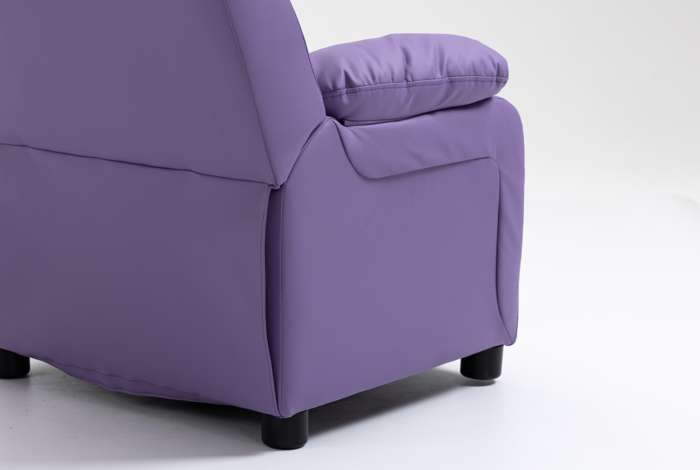 Purple faux leather kids recliner chair front view, upright position for toddlers and children Purple faux leather kids recliner chair front view, upright position for toddlers and children