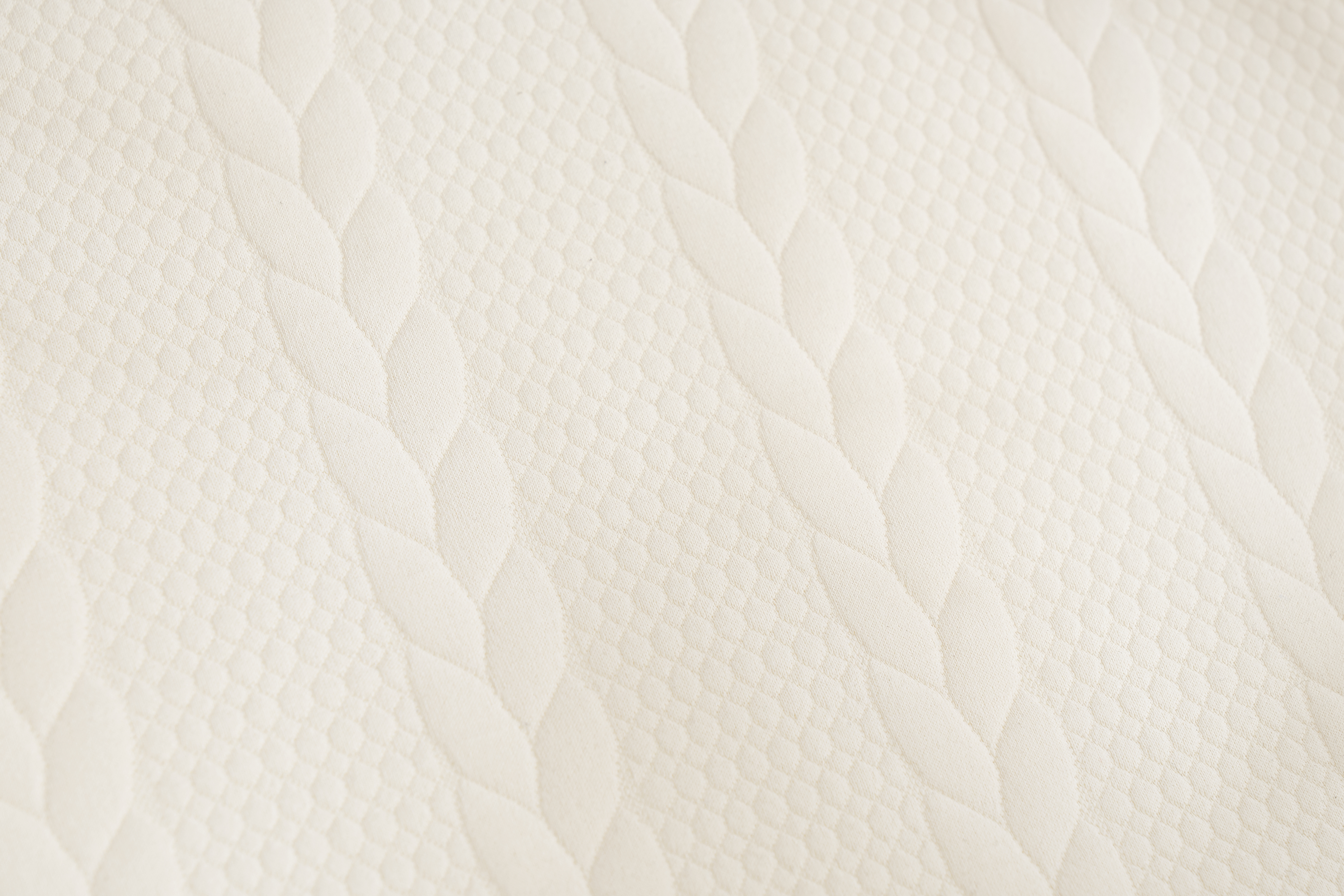 Modular adjustable bed wedge pillow set in cream color, 2-piece combination on bed Modular adjustable bed wedge pillow set in cream color, 2-piece combination on bed